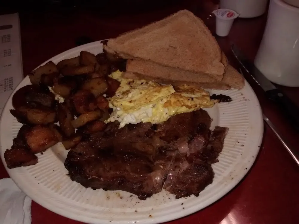 Steak and Eggs with Home Fries and Wheat Toast